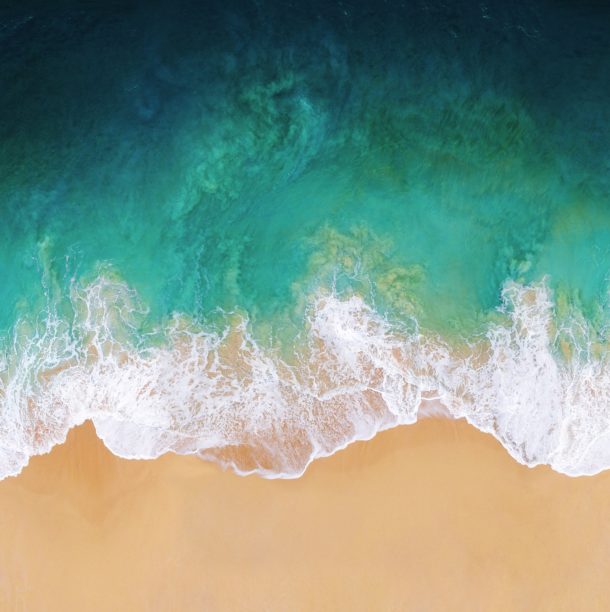 Obtén la hermosa escena de playa de fondo de pantalla predeterminada de iOS 11